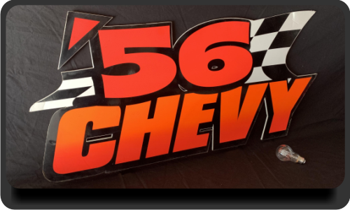 '56 Chevy Sign. Fluorescent orange and red.